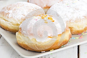 Donuts with frosting and powdered sugar