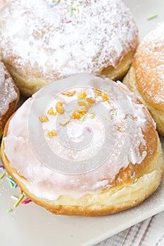 Donuts with frosting and powdered sugar