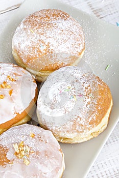 Donuts with frosting and powdered sugar