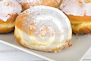 Donuts with frosting and powdered sugar