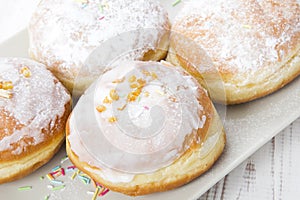 Donuts with frosting and powdered sugar