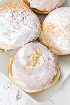 Donuts with frosting and powdered sugar