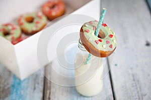 Donuts with icing and color heart sprinkles