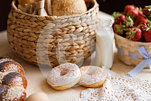 Donuts on the kitchen table, kitchen still life, rich breakfast