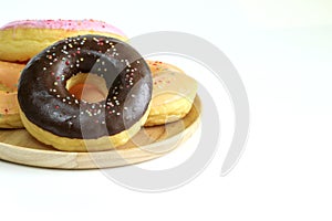 Donuts on white table background.