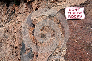 Donâ€™t throw rocks sign