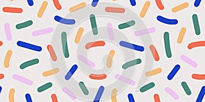 Doodle abstract background with rainbow colors confetti or sugar sprinkles. Funky seamless pattern. Multi colored