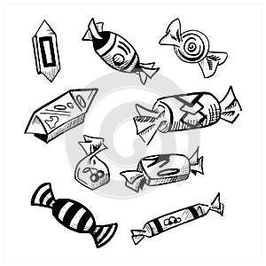 Doodle candies set. Hand drawn vector illustrations of candy canes, sweetmeats, sweets and sweet-stuff. Black drawing photo