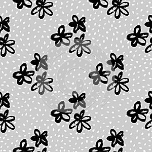 Doodle floral grunge daisy seamless pattern. Black contoured botanic elements on pale blue background with dots