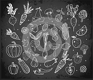 Doodle fruits and vegetables on blackboard background. Vector sketch illustration