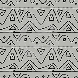 Doodle seamless pattern with broken wavy lines, triangles, dots on grey background