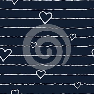 Doodles hand-drawn seamless pattern heart pattern on striped dark blue background.