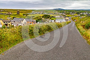 Doolin village with houses and farm fields