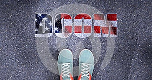 Doom and politics in the USA, symbolized as a person standing in front of the phrase Doom in American flag colors to show that