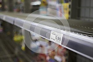 Doomsday shoppers run on toilet paper. Empty shelfs in Bern Switzerland due to Covid-19 prepping