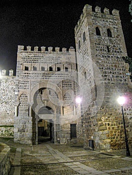 Door of Alfonso sixth at night in wall of Toledo