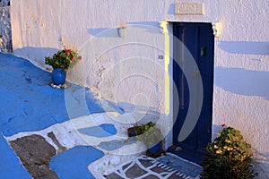 Door from the alley at a greek house in Plaka village, on Milos island