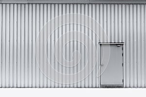 Door on aluminium wall factory warehouse.