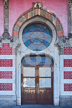 The door of an ancient building with an elegant work