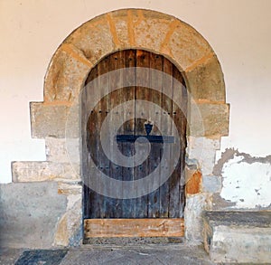 door of a ancient church in Villarino de Manzanas, Zamora photo