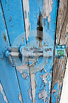 Door bolt with flaking paintwork photo