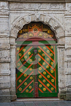 Door of the Brotherhood of Blackheads. Tallinn, Estonia. Old beautiful door with decor in the old town