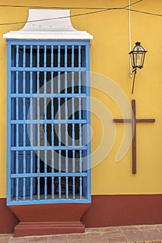 Door and a Christian Cross on a colonial house in Trinidad, Cuba