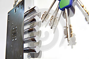 Door chubb detector lock and keys on white photo