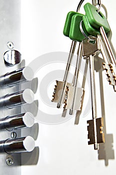 Door chubb detector lock and keys on white photo