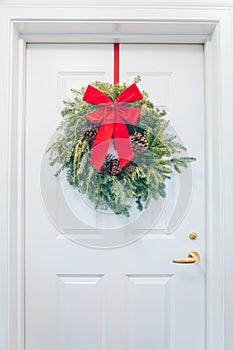 Door decorated for winter Holiday season