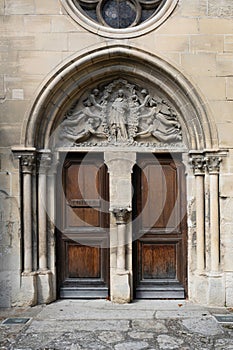 Entrance in the church in Auvers sur Oise, France photo