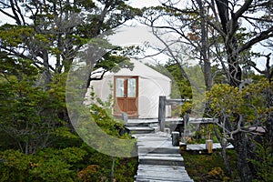 Door and entrance of the luxury yurt in the forest photo