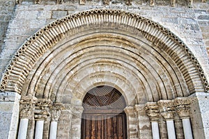 Door and facade of the ancient 12th century Parish Church San Juan Evangelista in Valladolid photo