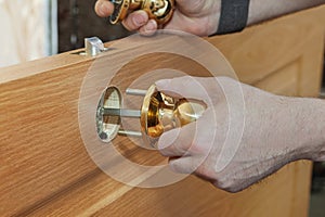 Door Furniture, woodworker installing locked interior turning d