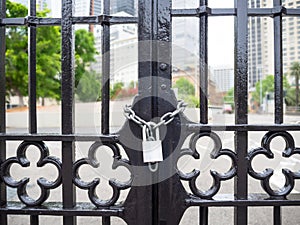 Door gate with silver chain lock