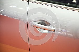 Door handle for the car. The handle comes complete with locks and other safety features.