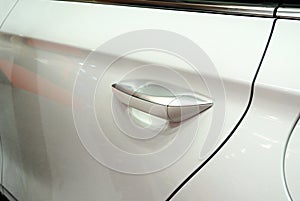 Door handle for the car. The handle comes complete with locks and other safety features.