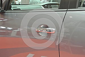 Door handle for the car. The handle comes complete with locks and other safety features.