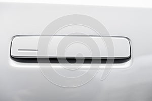 Door handle detail of a white 2023 Polestar 3 electric performance SUV..