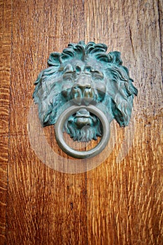 Door handle Lion with ring in mouth