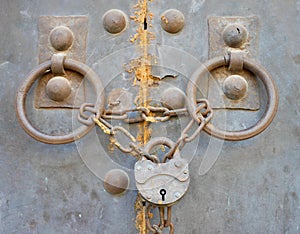 Door handle with lock and chain at Ananuri Fortress, Georgia.