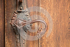 Door handle of an old historical building made of iron