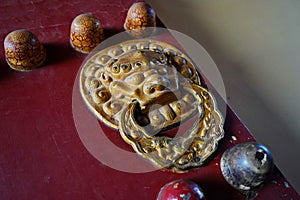 Door handles in the shape of an animal\'s head. Tiantan Sky Temple photo