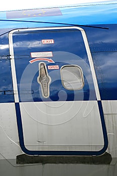 Door (with instructions) of an airplane