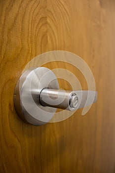 Door Knob with Thumb Lock on Wooden Door