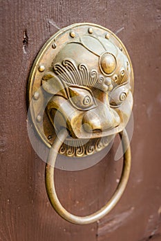 Door Knocker on old wooden door