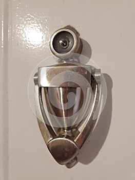 Door knocker with peep hole
