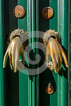 Door knockers in the form of hands, Portugal photo