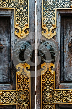 Door and knockers at the Thien Tru Temple near the Perfume Pagoda in Northern Vietnam