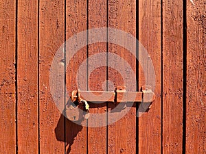 Door lock for key closing, keyhole, hasp bolt. Collection of old vintage retro locks on the textured colored door. Close-up